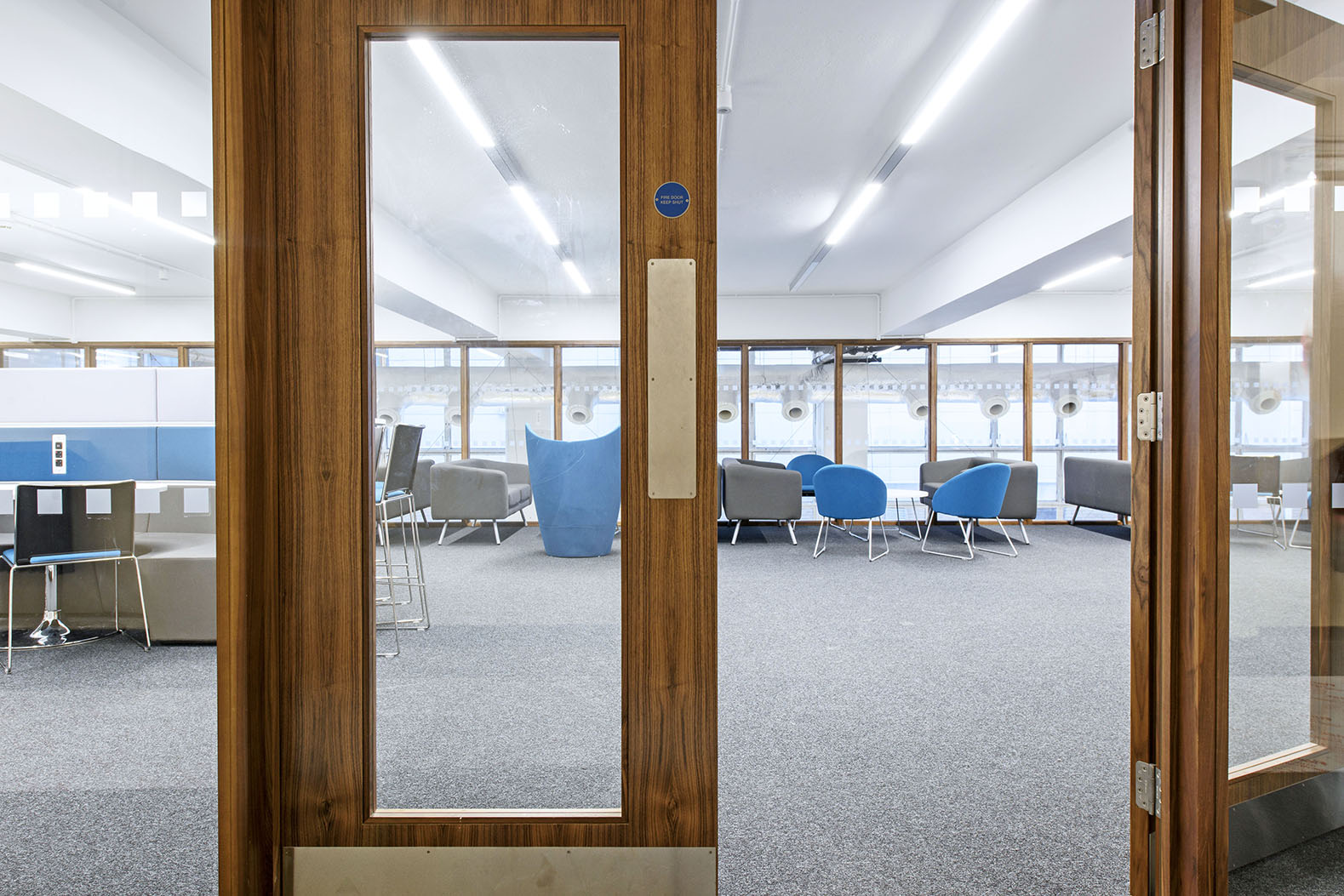 Walnut fire door and glazed screens at the Royal Veterinary College; image courtesy of Ahmarra